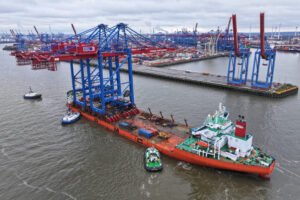 container port with cranes and cargo ships