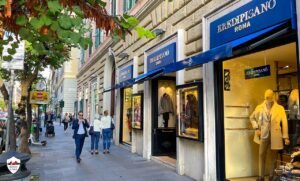 via cola di rienzo affollata con negozi eleganti